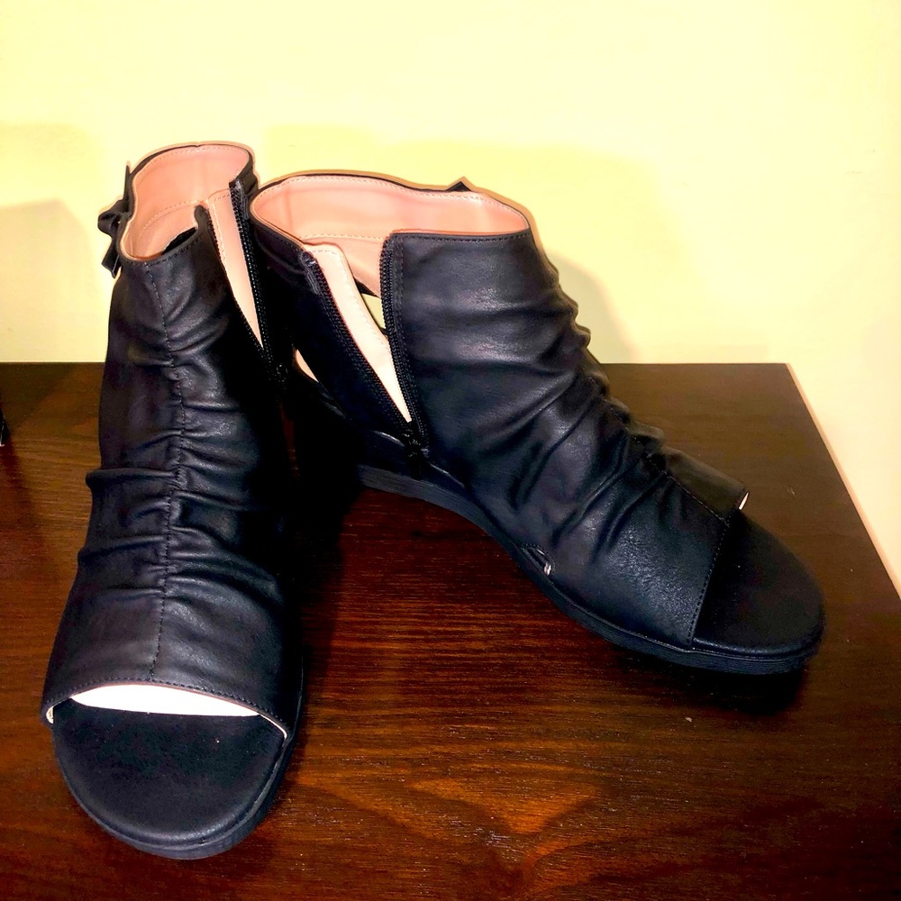 Women’s slouchy backless bootie.  Wedge Size - 10.  Black. Great condition!